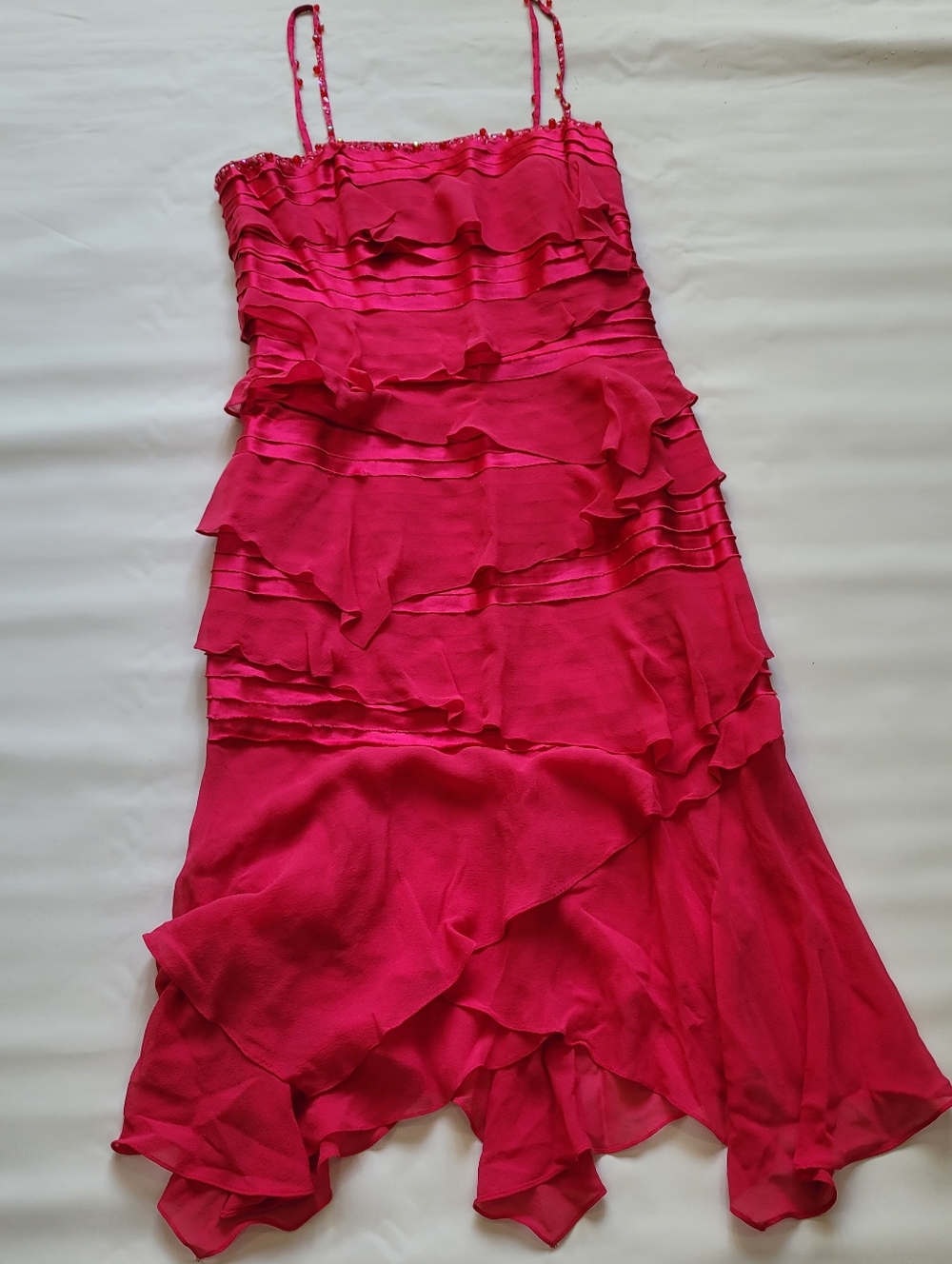 Jovani pink Fuchsia ruffle asymmetrical dress with sequins and beads.